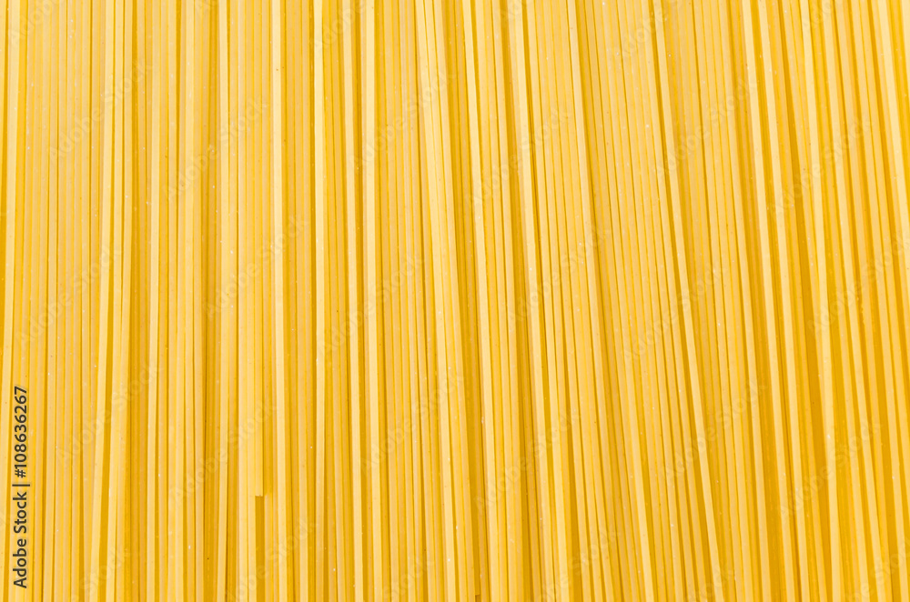 Background of uncooked spaghetti - obrazy, fototapety, plakaty 