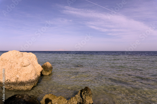 Sea and colorful clouds on a sky