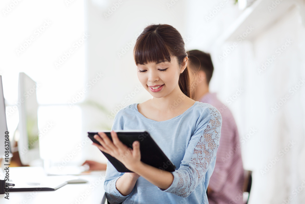 happy creative female office worker with tablet pc happy creative female office worker with tablet pc
