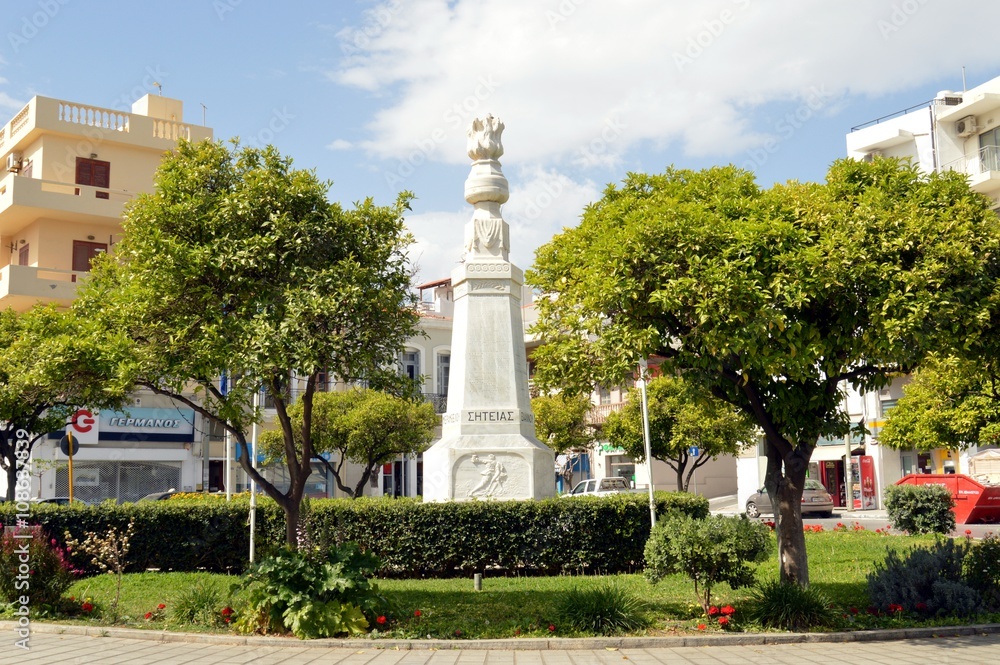 Small park with an obelisk.