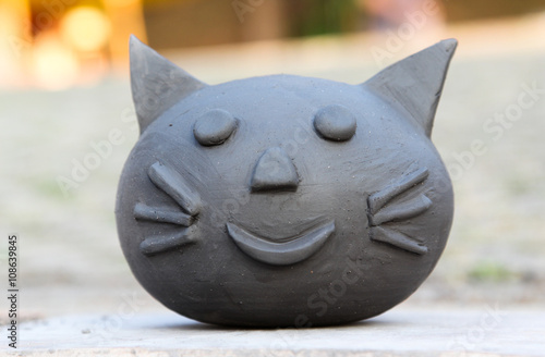 Cat sculpture made from clay.