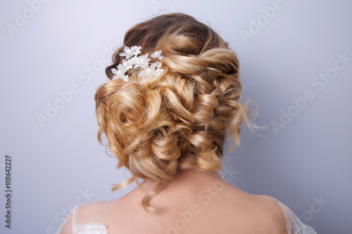 beautiful woman bride with tiara on head on bright background , copy space.