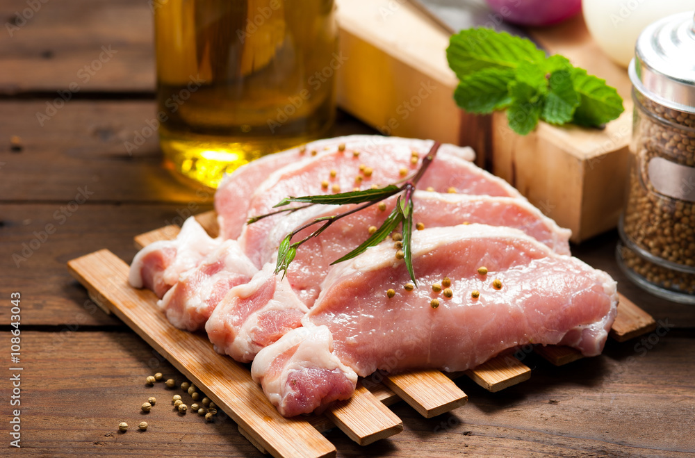 Meat, pork, slices pork loin on wood Meat, pork, slices pork loin on wood