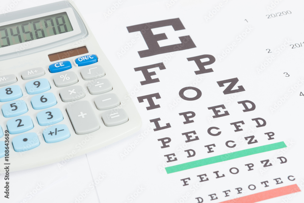 Table for eyesight test with calculator over it