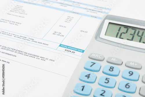 Unpaid utility bill and calculator over it series