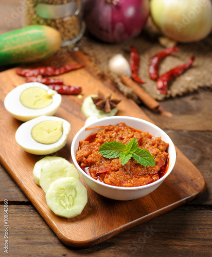 Thai food,Spicy Chili Paste (Nam Prik) with vegetables on wood