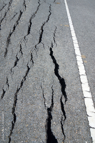 Wallpaper Mural Fissures and erosion of the asphalt road by the earthquake. Torontodigital.ca