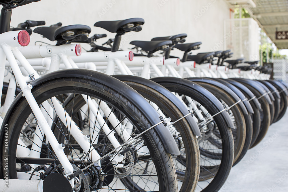 Group of bikes in parking in the city Group of bikes in parking in the city
