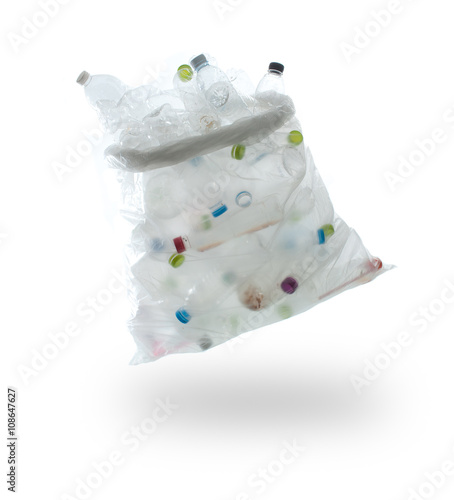 garbage bag with plastic bottles on a white background.,recyclin photo