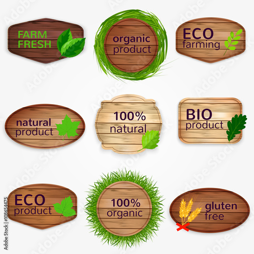 Wooden Eco labels , bages, stickers collection with green leaves and grass - Bio and natural product, natural, gluten free, organic product, farm fresh.
