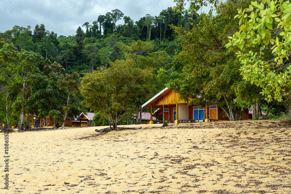 Wooden bungalows on Siuri Beach at Poso lake. Indonesia
