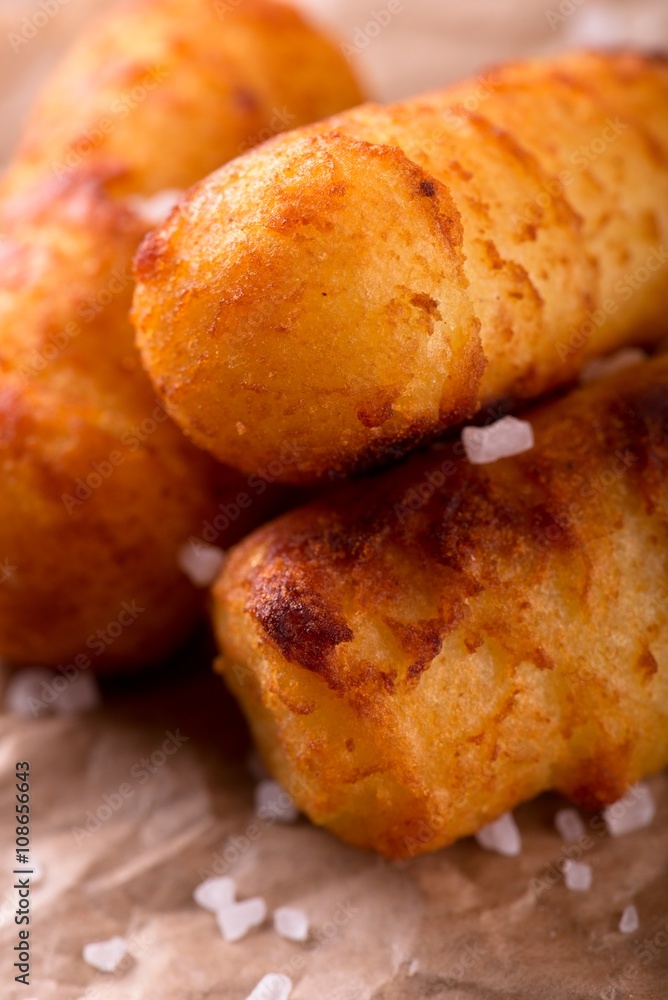Detail of crispy potato croquettes with salt Detail of crispy potato croquettes with salt