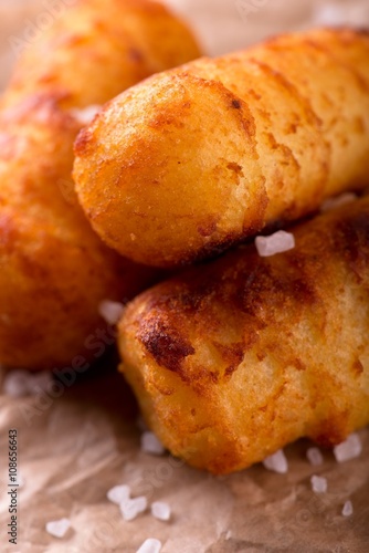 Detail of crispy potato croquettes with salt