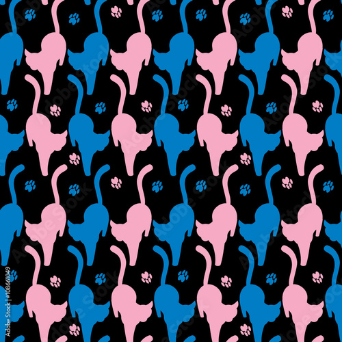 Blue and pink silhouettes of the cats on a black background. Vector seamless pattern.
