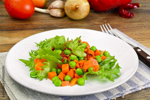 Juicy Vegetable Stew. Lettuce, Peas and Carrots. Diet Food