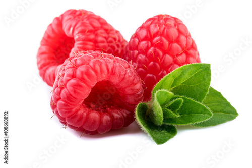 raspberries with mint leaf close up