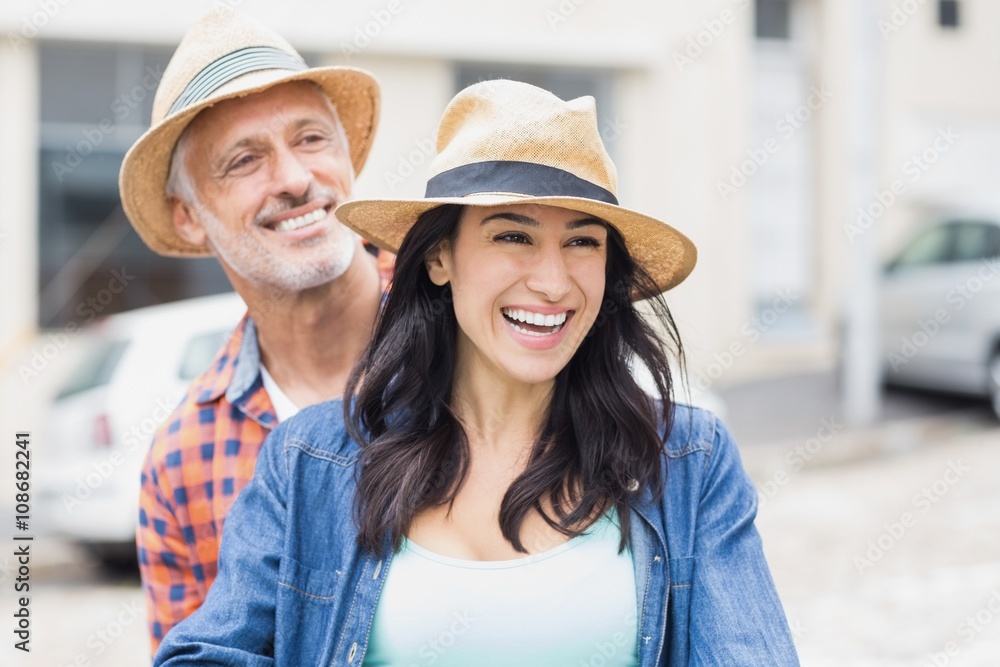 Happy couple wearing hat