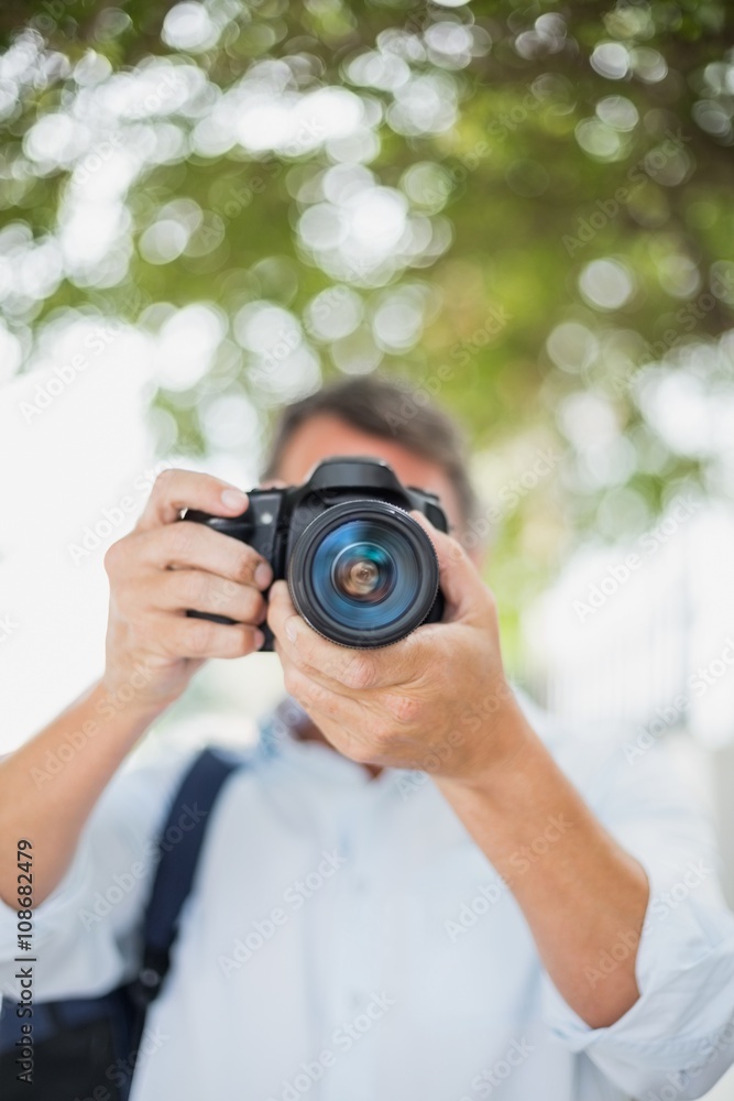 Close-up of man using camera Close-up of man using camera