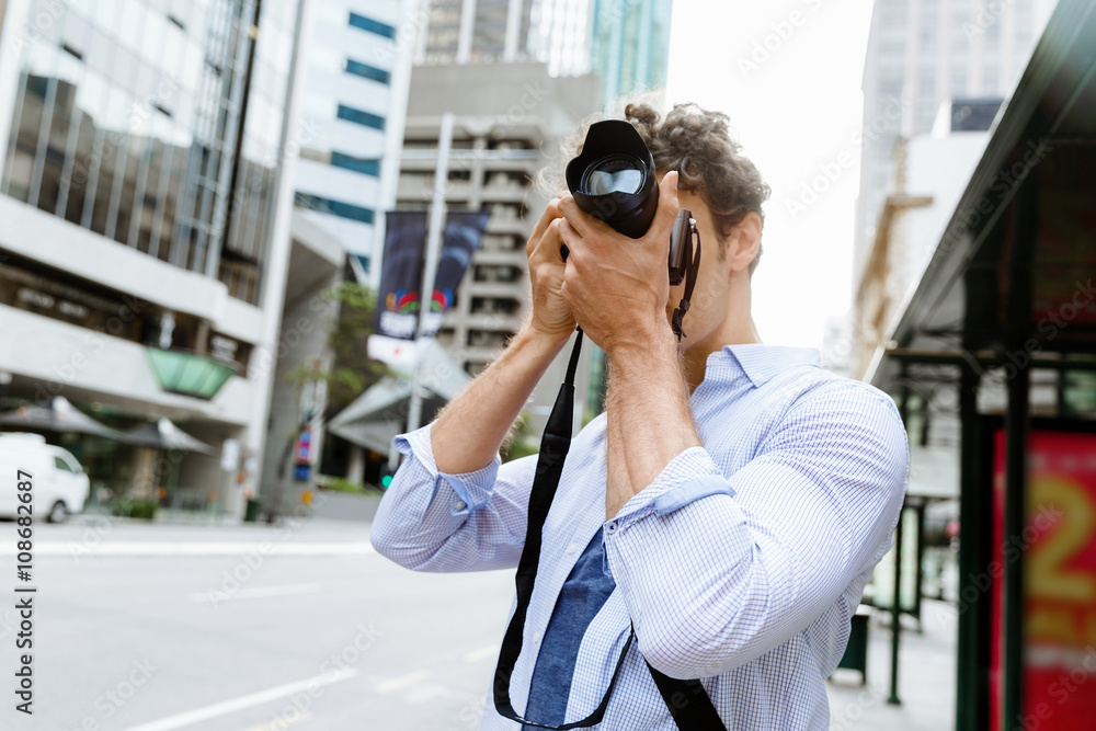 Male photographer taking picture Male photographer taking picture