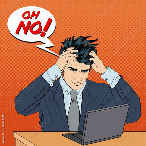 Stressed Man at Work. Man Grabbed His Head. Businessman with Laptop