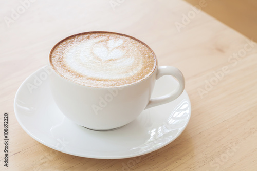 Latte Coffee art on the wooden table