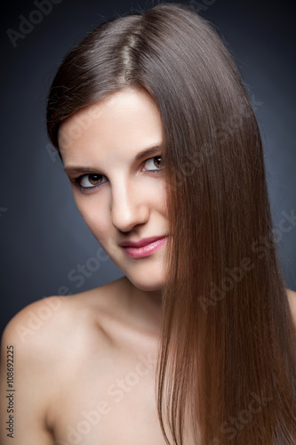 Beautiful brunette with long straight hair