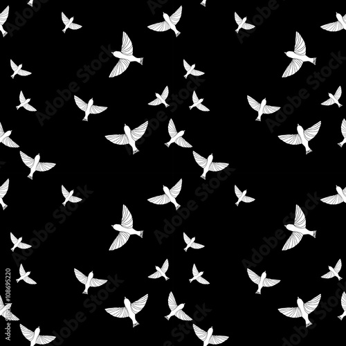 Canvas Print Seamless pattern with white birds on black background