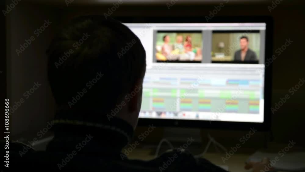 Video Editor Works at the Computer Video Editor Works at the Computer