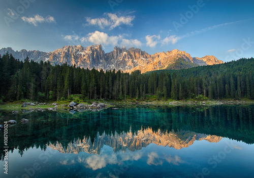 Fototapeta Naklejka Na Ścianę i Meble -  Lake with mountain forest landscape, Lago di Carezza