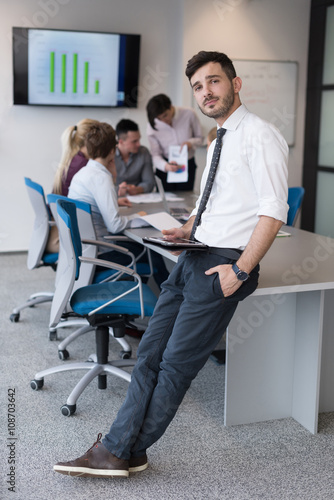 young business man with tablet at office meeting room