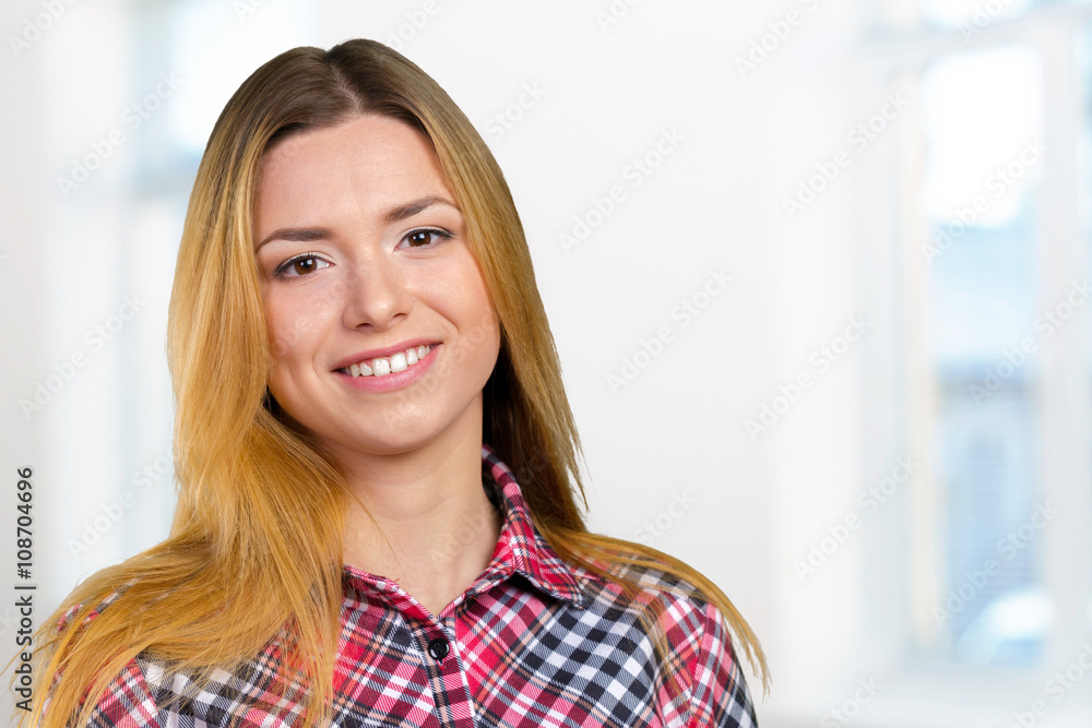 Portrait of happy smiling young beautiful woman