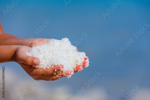 Hands with salt Dead Sea