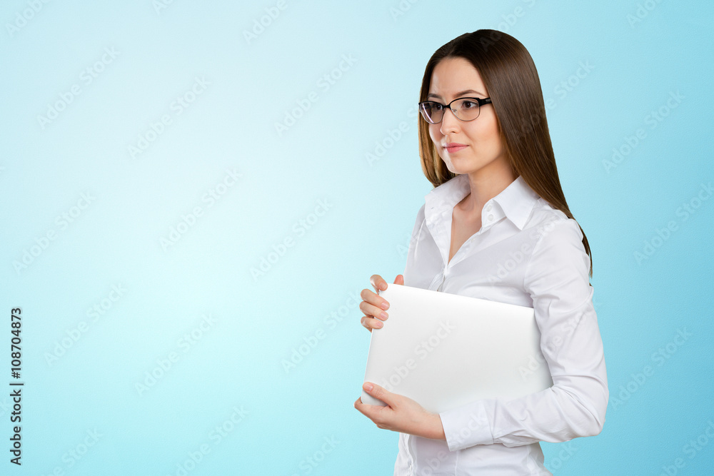 Pretty young businesswoman with laptop Pretty young businesswoman with laptop
