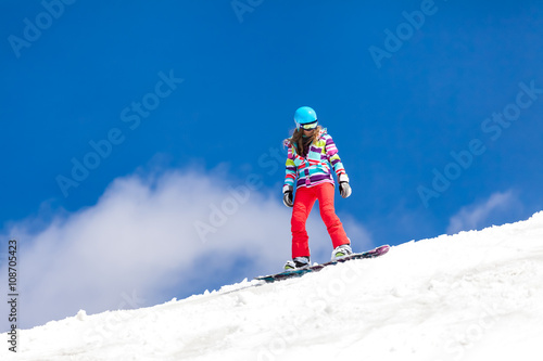 girl in action-snowboarding