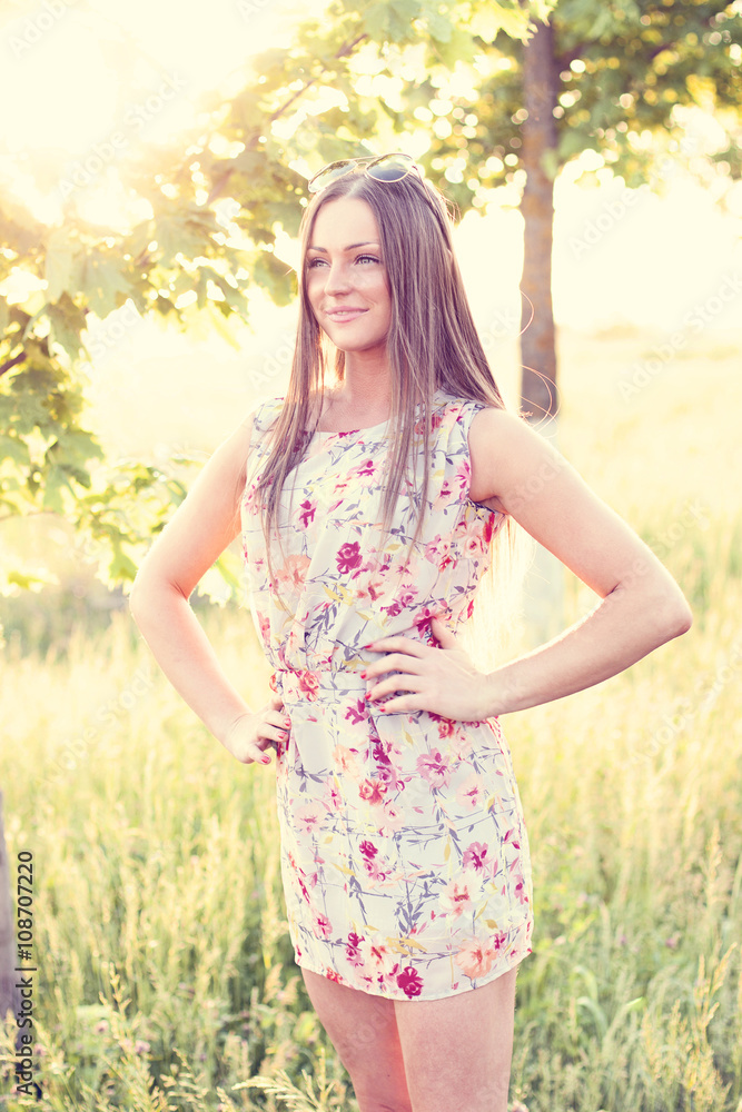 Beautiful girl field green meadow in summer park delicate dress, enjoying leisure, fashion style, glamor life, student at a bright sunny day. Beautiful girl field green meadow in summer park delicate dress, enjoying leisure, fashion style, glamor life, student at a bright sunny day.