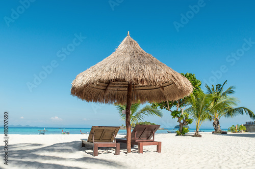 Fototapeta Naklejka Na Ścianę i Meble -  Summer, Travel, Vacation and Holiday concept - Beach Chairs and