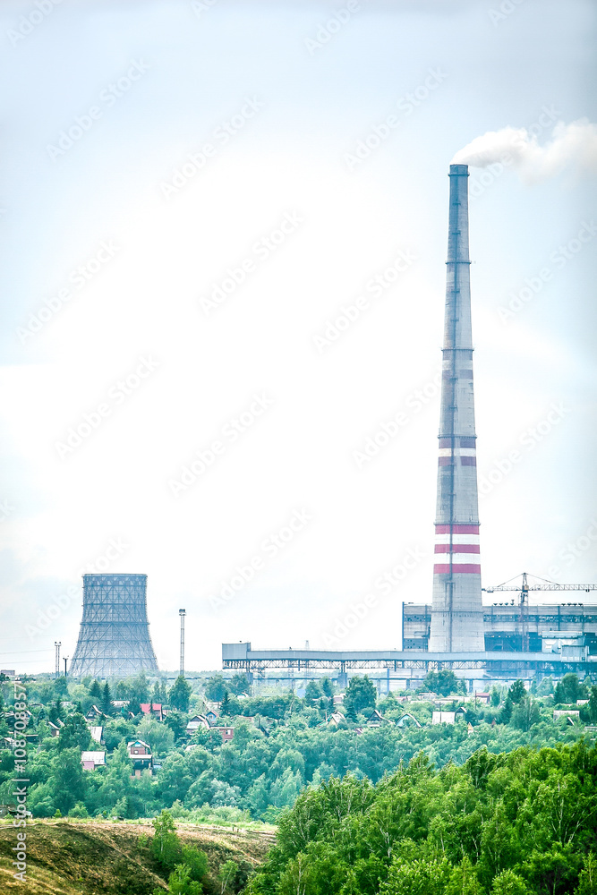 Obraz premium Factory with smoking chimneys