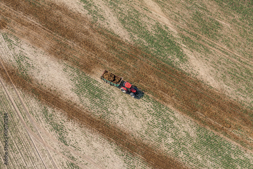 aerial view of the tractor on the harvest field © mariusz szczygieł