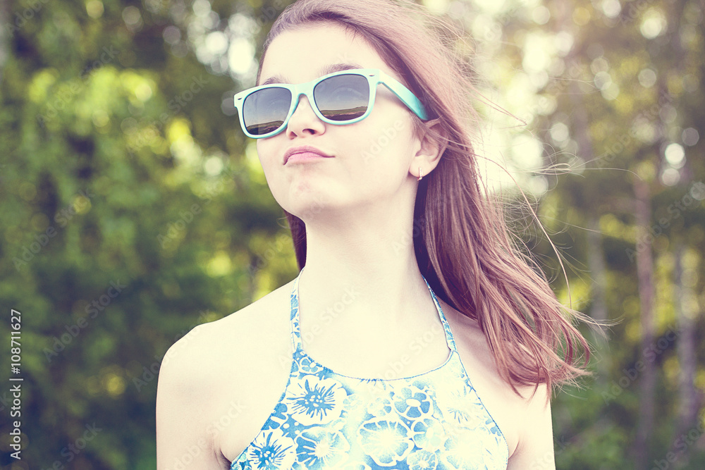 Beautiful natural beauty little girl schoolgirl student wears glasses dress summer bright sunny day outdoors fresh air idea concept fashion style happy smiles Beautiful natural beauty little girl schoolgirl student wears glasses dress summer bright sunny day outdoors fresh air idea concept fashion style happy smiles