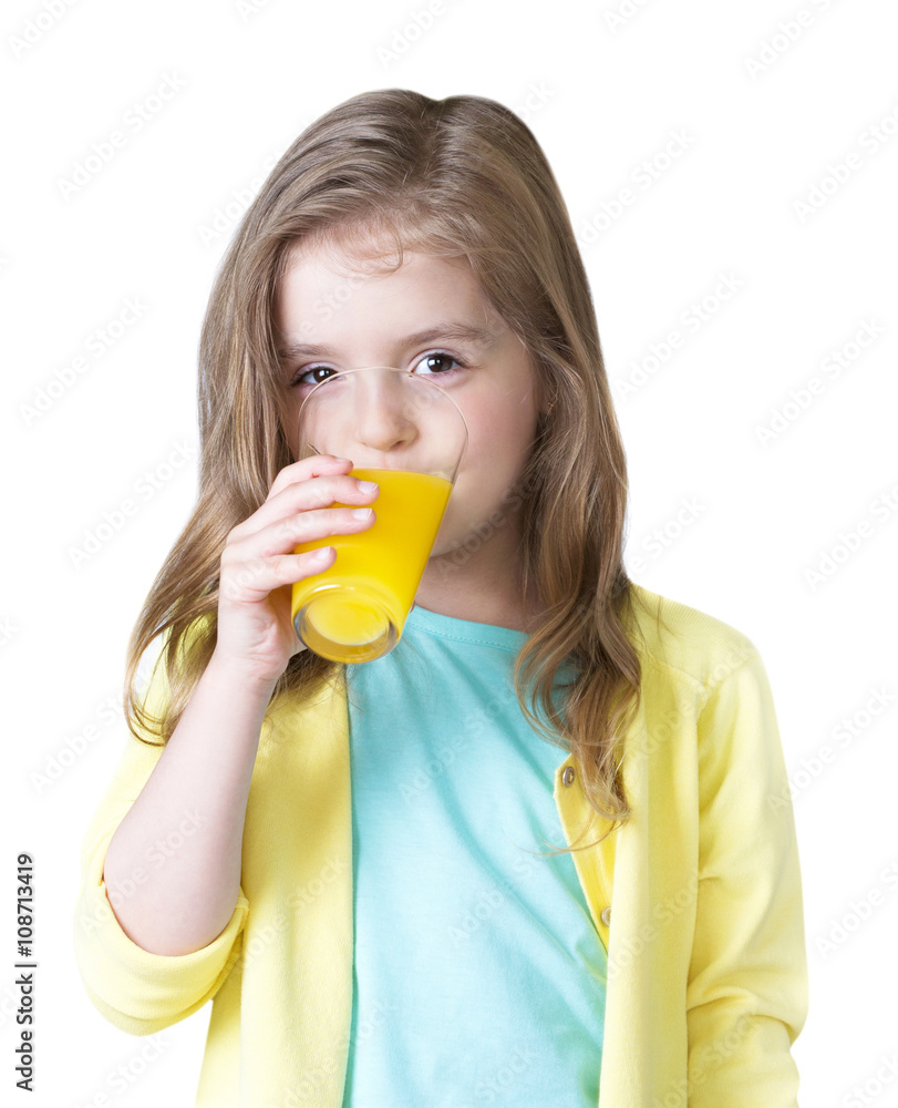 Child girl drinking orange juice isolated on white. Child girl drinking orange juice isolated on white.
