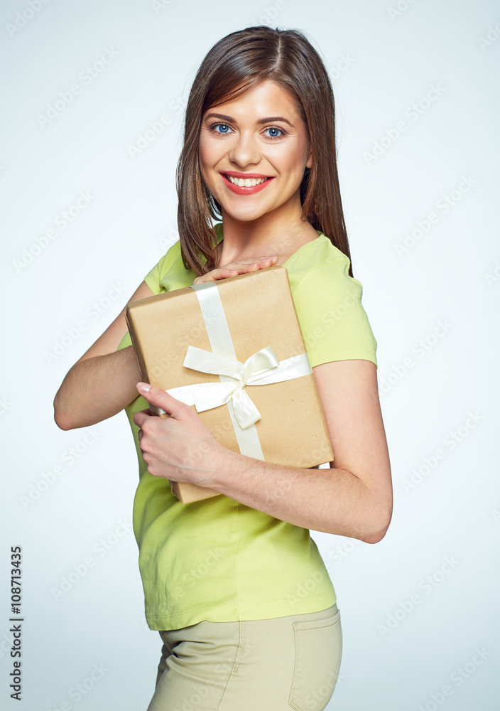 Beautiful girl with present. Casual dressed woman Beautiful girl with present. Casual dressed woman
