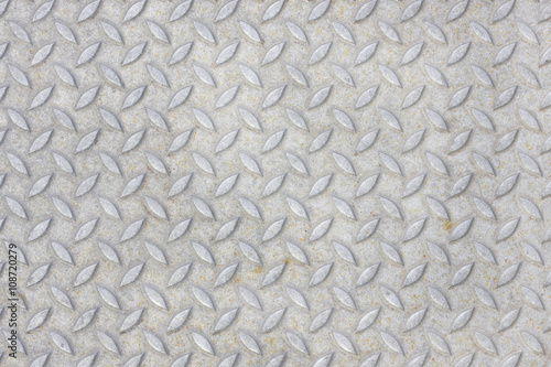 Grey metallic surface with cross pattern