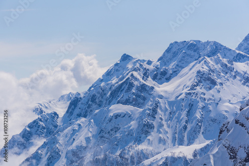 Winter mountain landscape and cloudy sky. © Vasily Merkushev