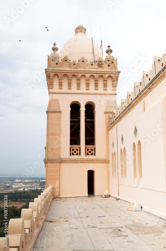 Tower and dome of Cathedral of Saint Louis of Carthage located in Tunisia photo