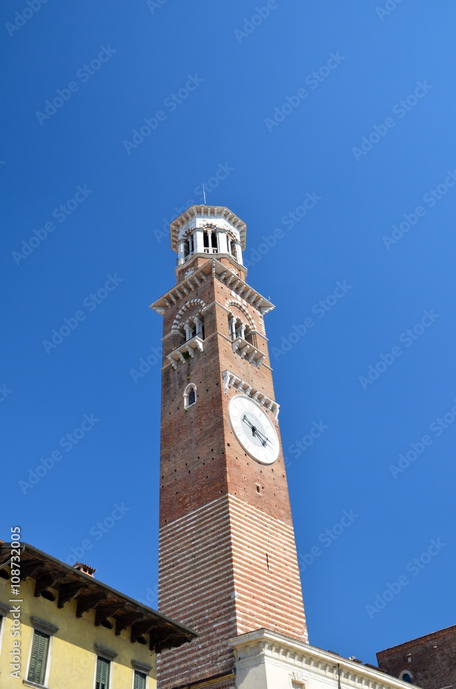 Tower of Lamberti, a beautiful medieval and renaissance tower with ancient clock in the center of Verona (15th century)