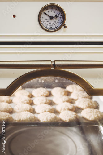 Modern electric oven. Inside baked cookies