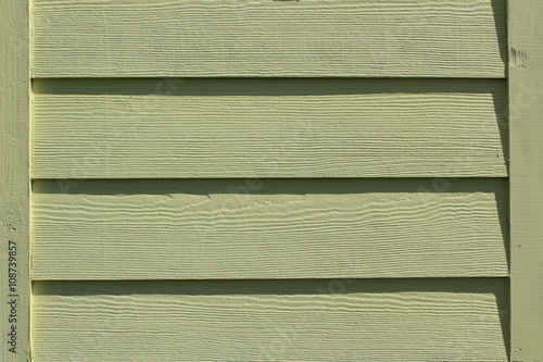 Yellow concrete siding wall
