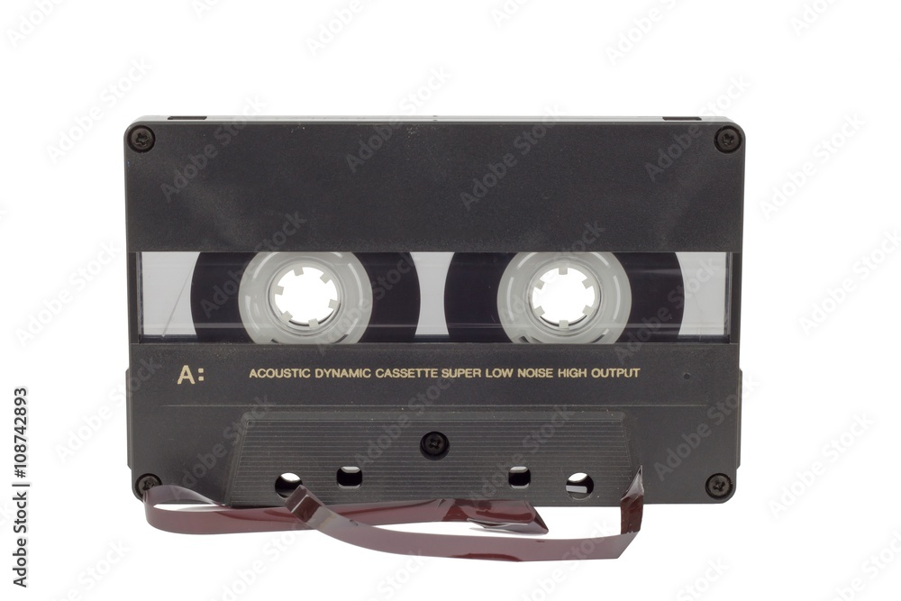 Obraz premium Old audio cassette isolated on white. Dusty damaged audio cassette, historical sound recording on magnetic tape. Place for your text. 