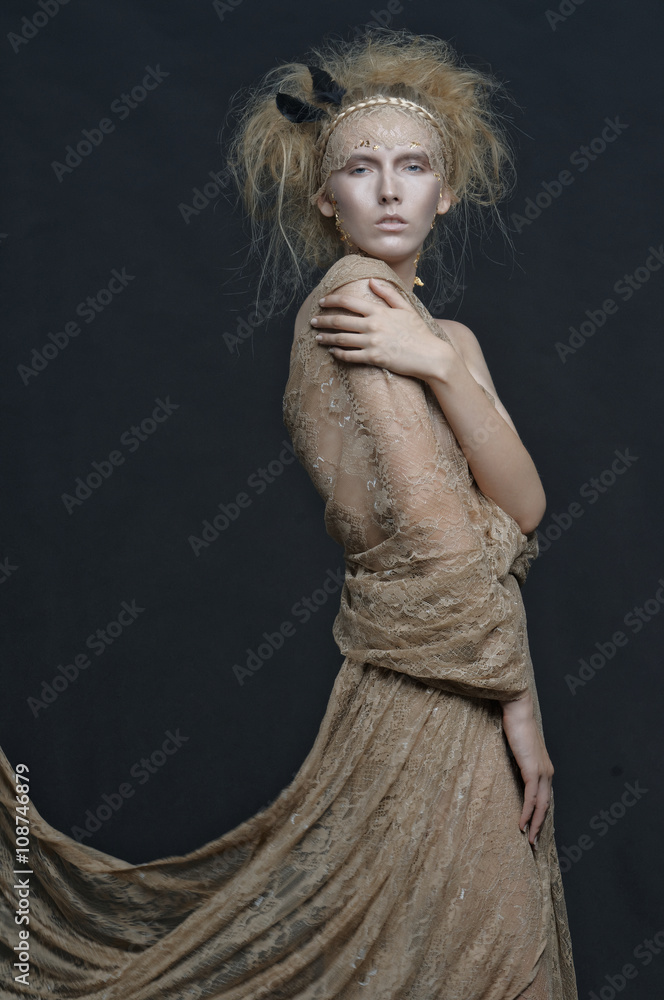 Beauty young model.Fashion Art Woman Shooting in the Studio.