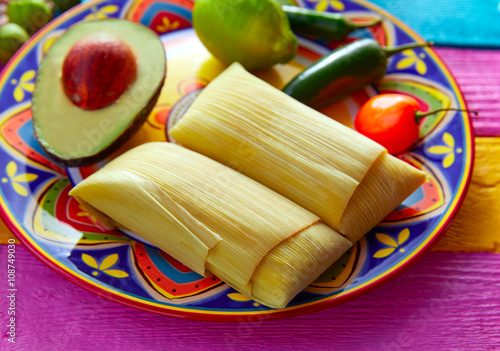 Mexican Tamale tamales of corn leaves photo